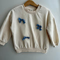 Pull léger à boucles H&M 1 1/2-2 ans  | Seconde main (Mini imperfection*)