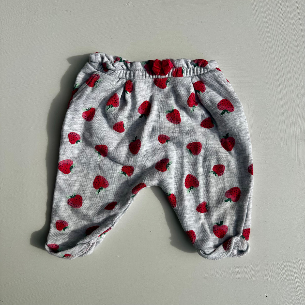 Pantalon fraises George 0-3 mois | Seconde main